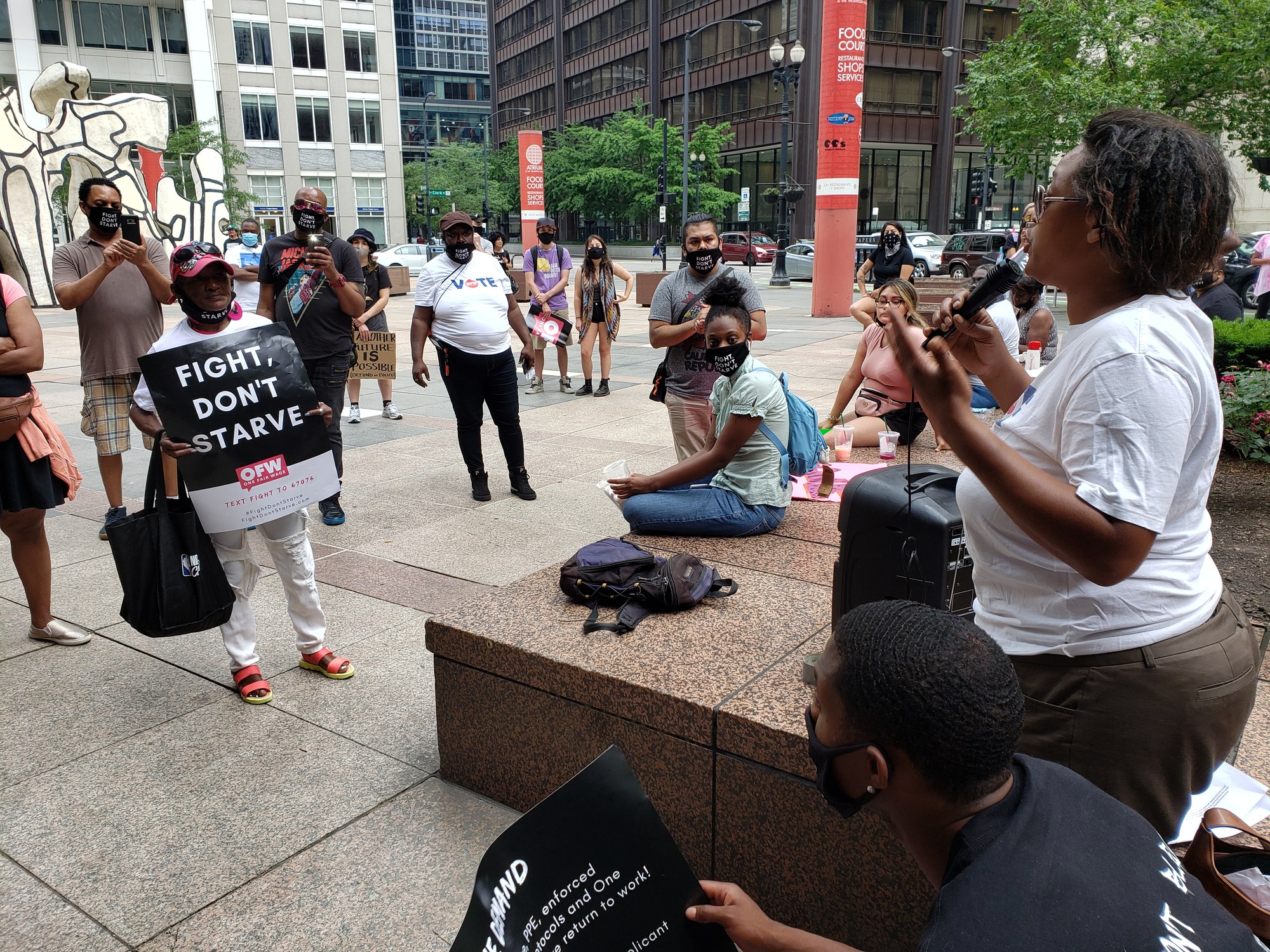 OFW Chicago members at a worker action in downtown Chicago